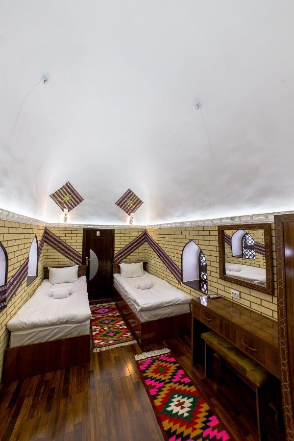 Feruzkhan Hotel - Madrassah Mohammed Rakhim Khan 1871 خيوة المظهر الخارجي الصورة